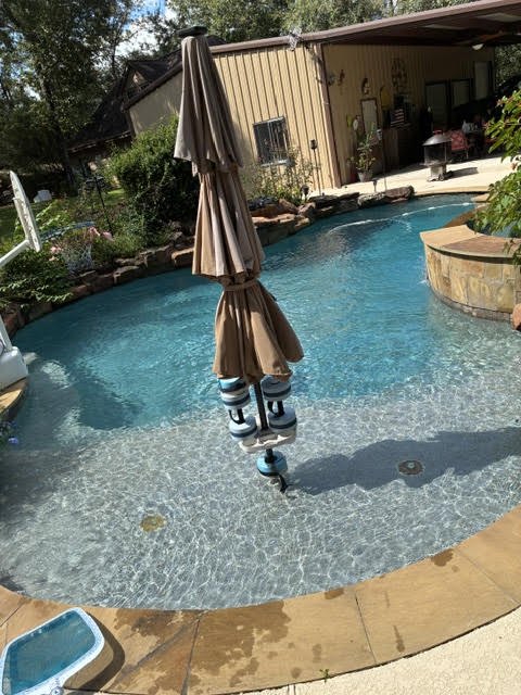 After: the same area of the pool brushed and vacuumed